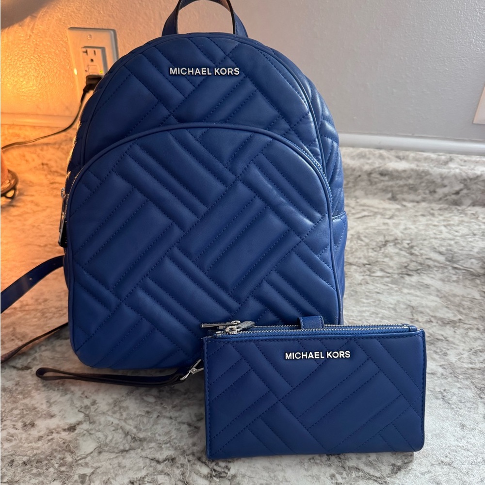Michael Kors backpack bag and wallet.😊